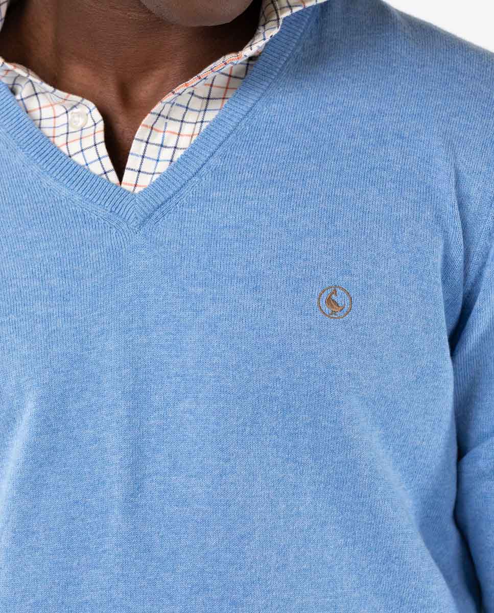 Suéter azul claro com decote em V